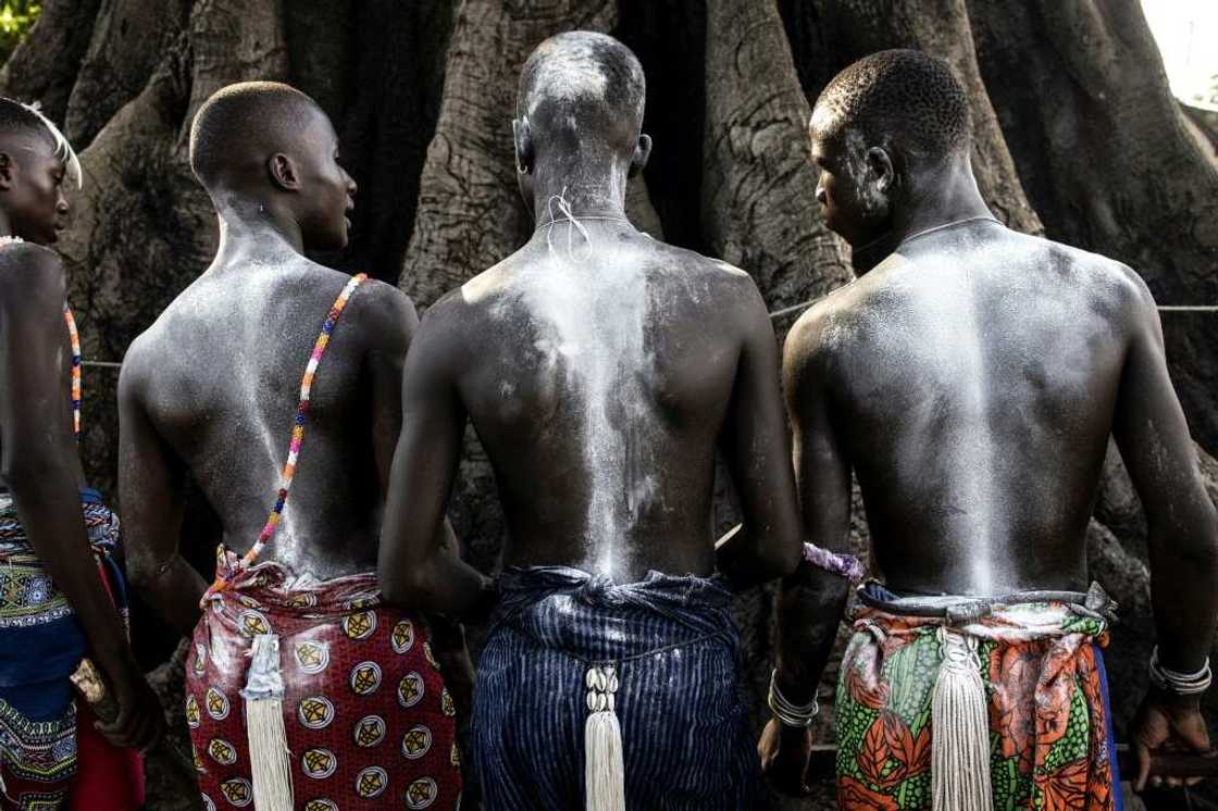 It may take a young man six or seven years to take the path from youthhood to adulthood -- elders pass on secret rites and lessons about the community It may take a young man six or seven years to take the path from youthhood to adulthood -- elders pass on secret rites and lessons about the community