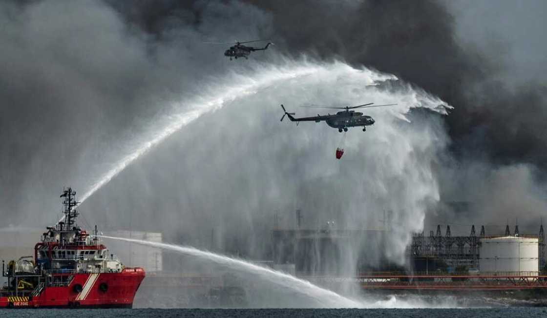 Cuba spent days battling a fire at a fuel depot with the help of Mexico and Venezuela, who both supplied fire fighters, experts and materials for the effort Cuba spent days battling a fire at a fuel depot with the help of Mexico and Venezuela, who both supplied fire fighters, experts and materials for the effort