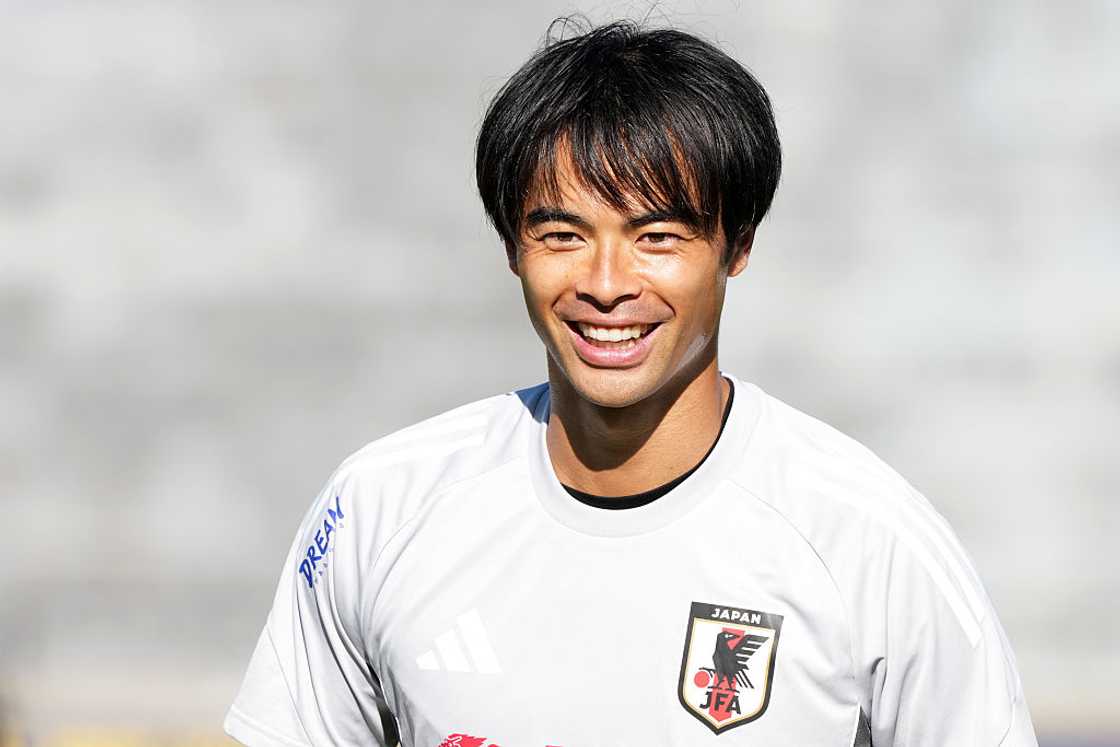 Kaoru Mitoma of Japan smiles during training session Kaoru Mitoma of Japan smiles during training session