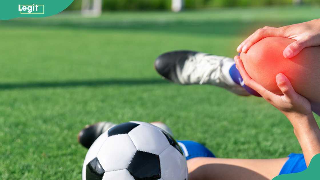 Soccer player with an accident knee injury