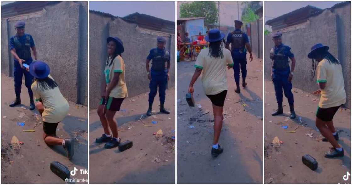 Comedienne Miriam Kesanga, lady dances for policeman, lady salutes policeman, cute policeman and lady video Comedienne Miriam Kesanga, lady dances for policeman, lady salutes policeman, cute policeman and lady video