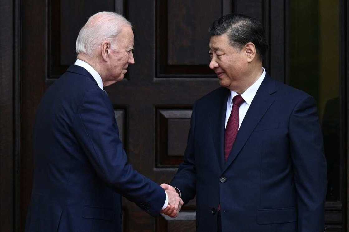 US President Joe Biden greets Chinese President Xi Jinping before their summit US President Joe Biden greets Chinese President Xi Jinping before their summit
