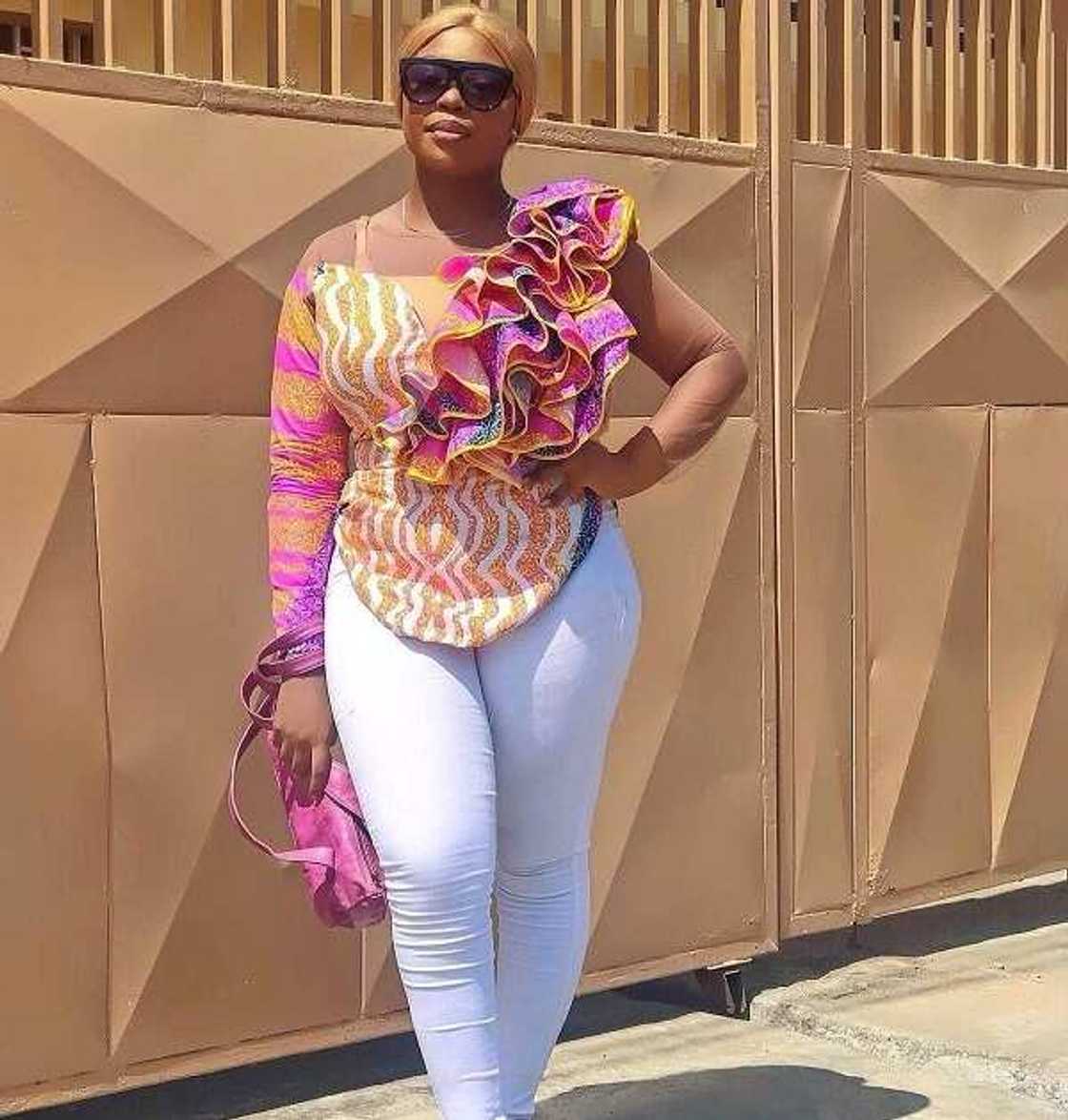 Ankara top with asymmetry and frills Ankara top with asymmetry and frills