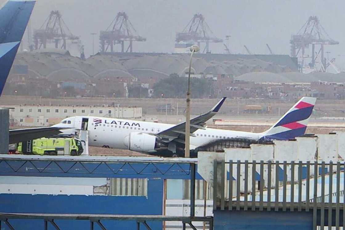 Flight LA2213 is seen after it collided with a fire fighting vehicle at the Jorge Chavez International Ariport in Lima on November 18, 2022