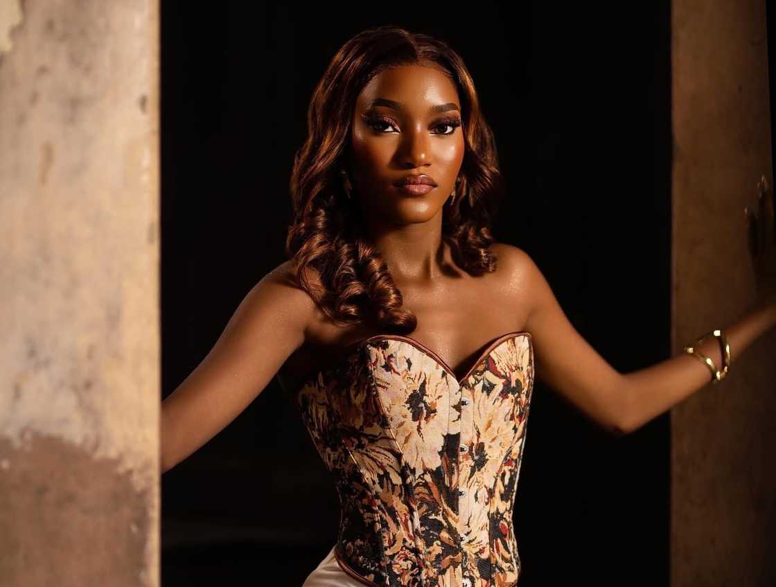 Oyin from BBNaija poses in a doorway