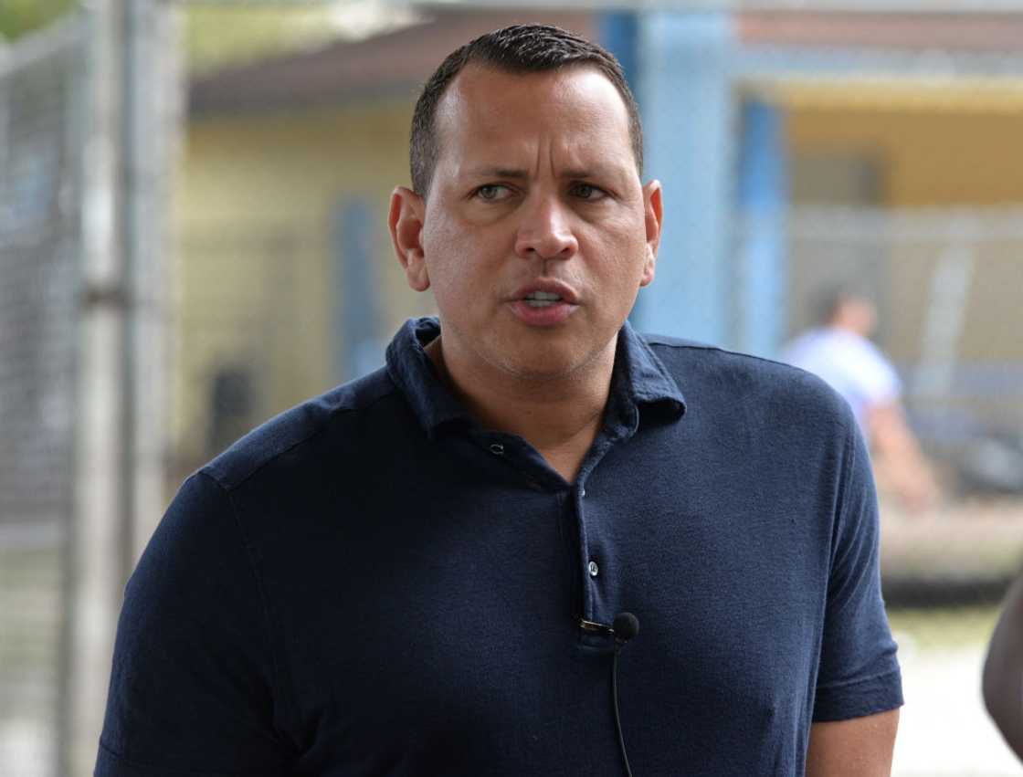 Alex Rodriguez looks on in a navy blue T-shirt Alex Rodriguez looks on in a navy blue T-shirt