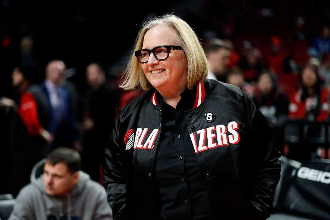 Jody Allen smiles while walking