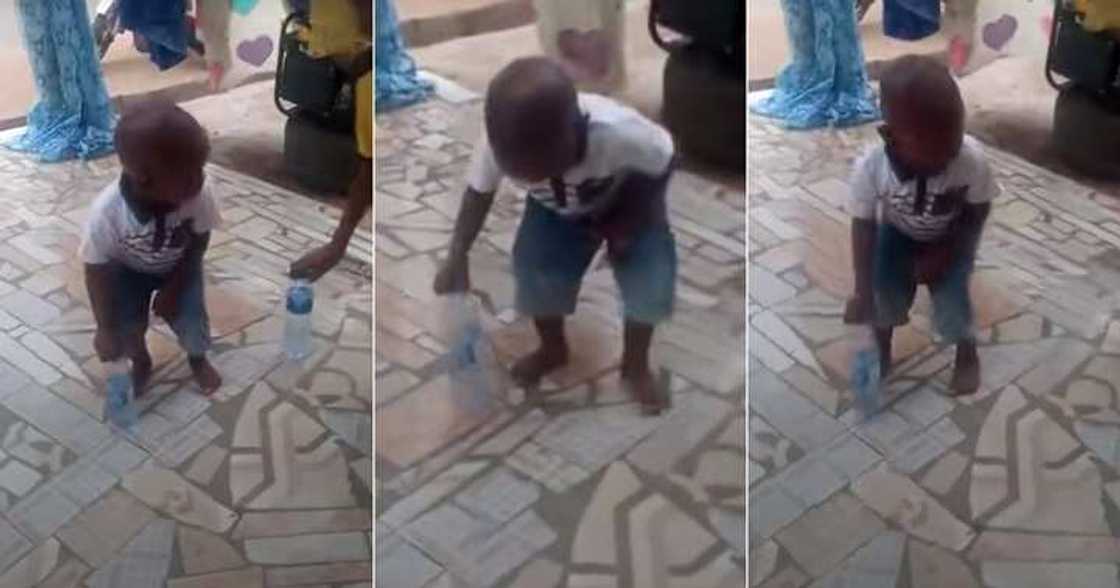 Little boy participates in bottle flip challenge Little boy participates in bottle flip challenge