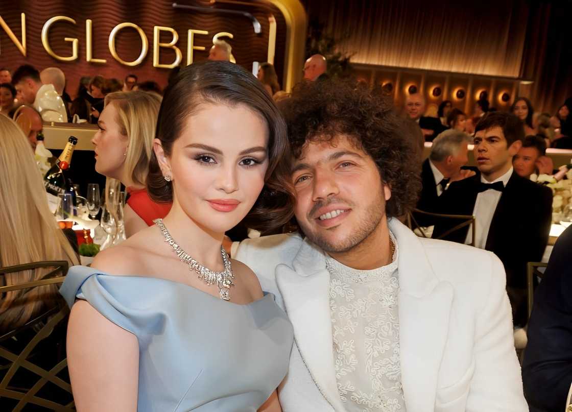 Selena Gomez and Benny Blanco posing at the 82nd Annual Golden Globes Selena Gomez and Benny Blanco posing at the 82nd Annual Golden Globes