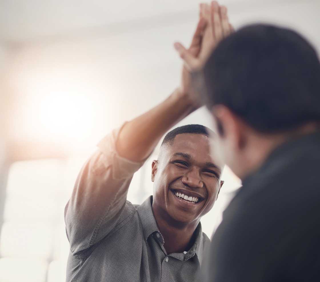 Happy men in a conversation Happy men in a conversation