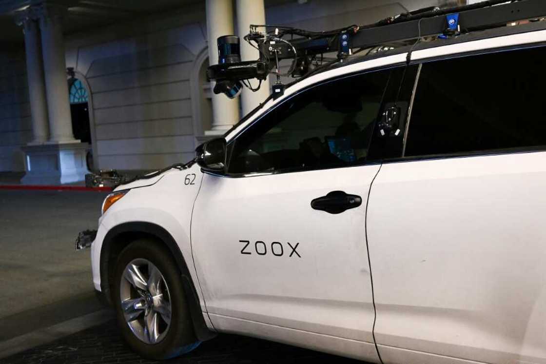 A Toyota sport-utility vehicle modified by Zoox, a subsidiary of Amazon.com, which combines radars, lidar, and cameras to test its software, drives on a road ahead A Toyota sport-utility vehicle modified by Zoox, a subsidiary of Amazon.com, which combines radars, lidar, and cameras to test its software, drives on a road ahead