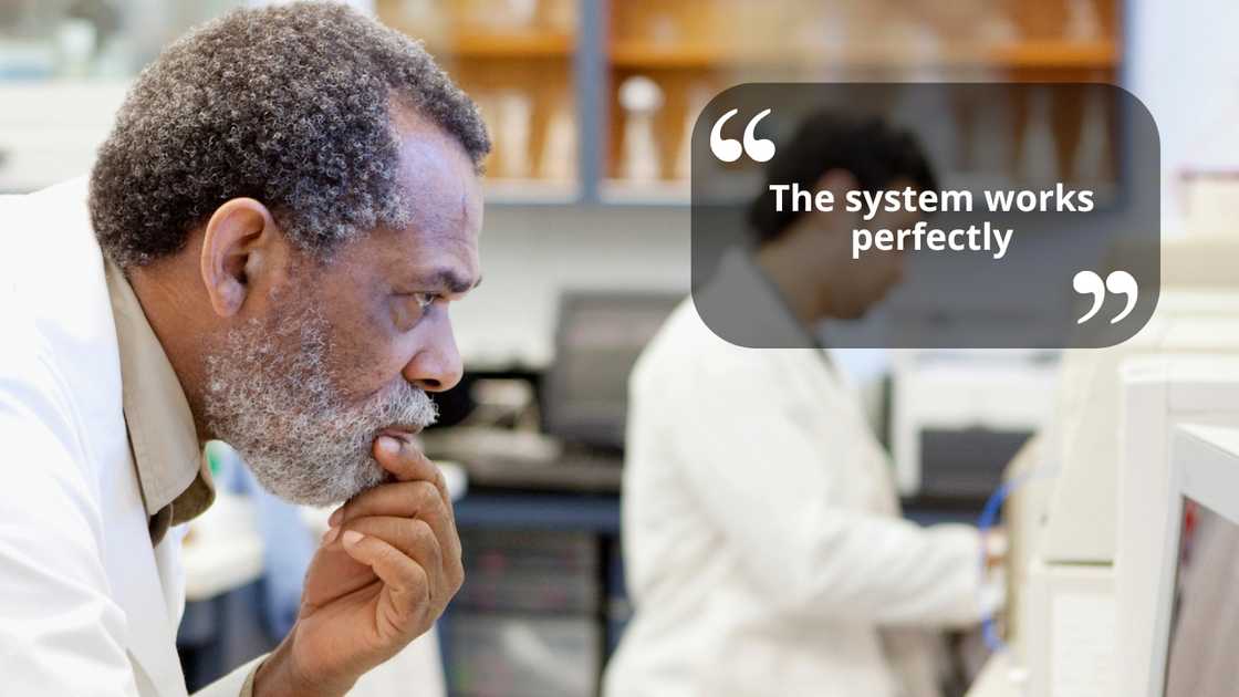 A senior scientist staring at a screen A senior scientist staring at a screen