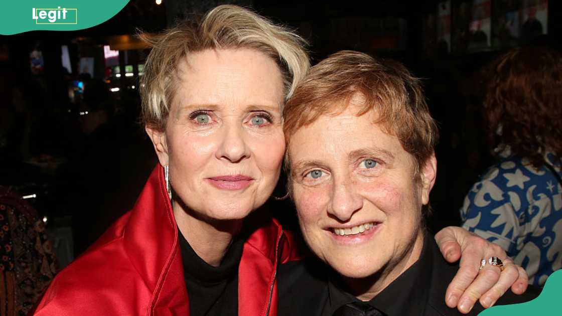 Cynthia Nixon and Christine Marinoni (R) pose for a photo