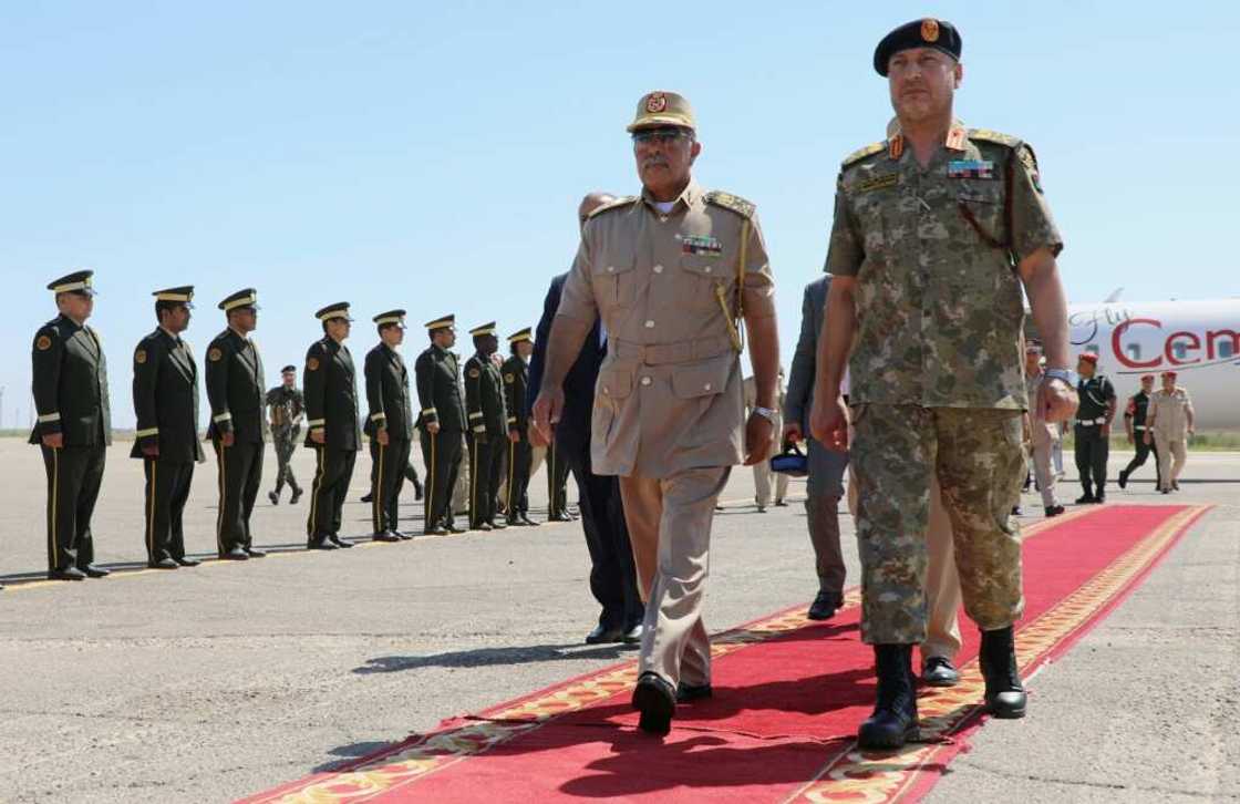 General Abdel Razaq al-Nadhouri (C), second in command of the forces of eastern-based strongman Khalifa Haftar, made an unprecedented visit to Tripoli on Monday and Tuesday to meet with his counterpart in the west, General Mohammad al-Haddad General Abdel Razaq al-Nadhouri (C), second in command of the forces of eastern-based strongman Khalifa Haftar, made an unprecedented visit to Tripoli on Monday and Tuesday to meet with his counterpart in the west, General Mohammad al-Haddad