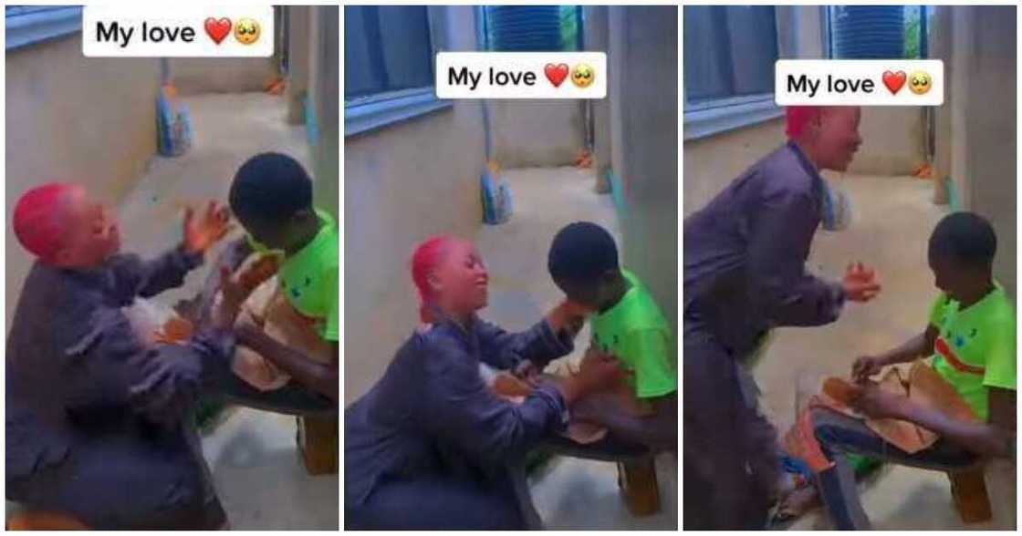 Aboki, a shoemaker, fixing footwear, lady expresses love Aboki, a shoemaker, fixing footwear, lady expresses love