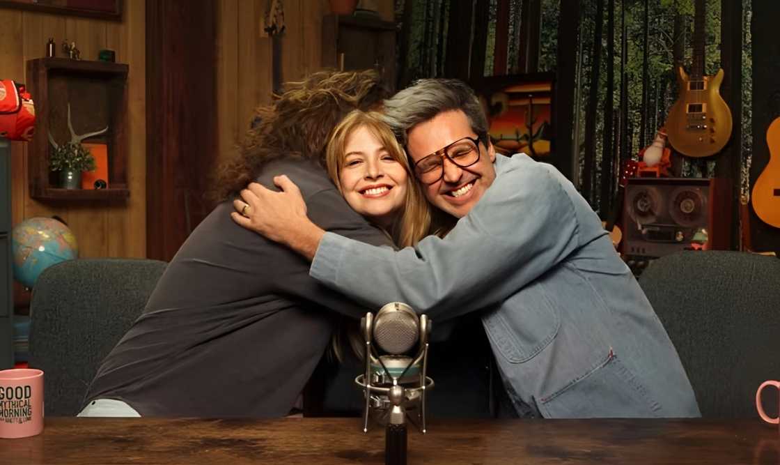 Stevie Wynne Levine shares a hug with Rhett McLaughlin and Link Neal Stevie Wynne Levine shares a hug with Rhett McLaughlin and Link Neal