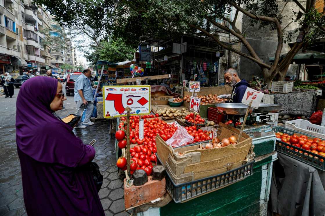 A roadside vegetable market in Cairo -- as Egypt implements IMF economic reforms, middle class purchasing power is eroding