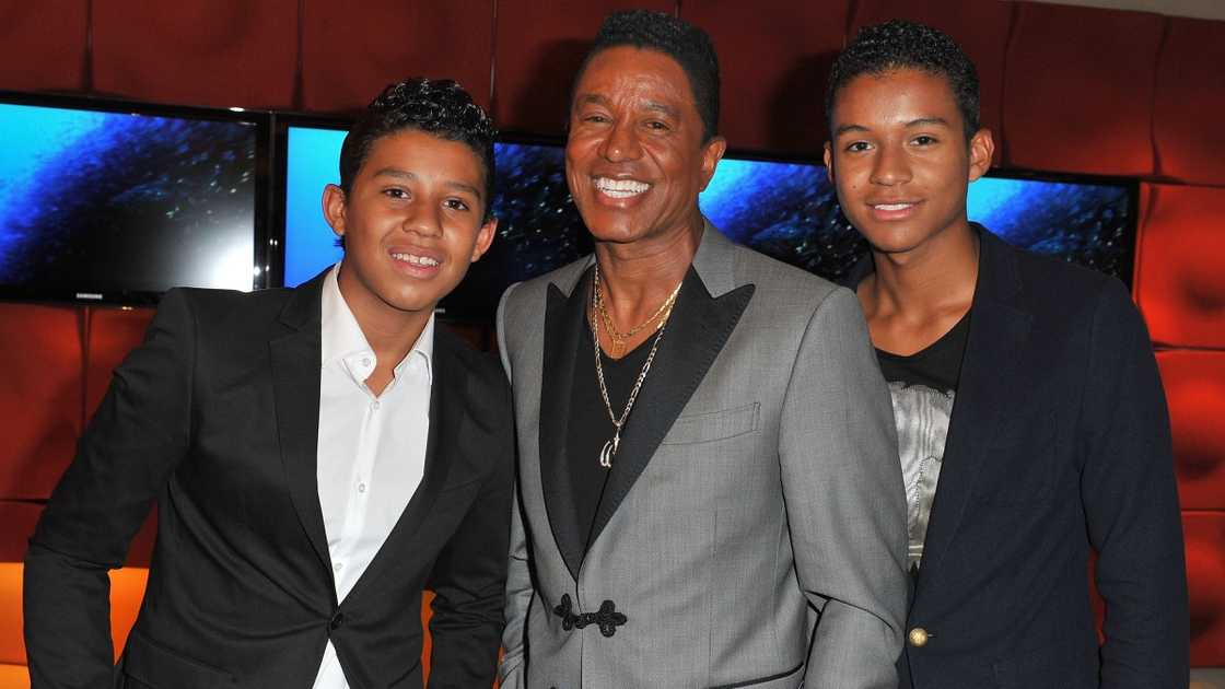 Jermaine Jackson (C) poses with his sons Jermajesty Jackson (L) and Jaafar Jackson (R).