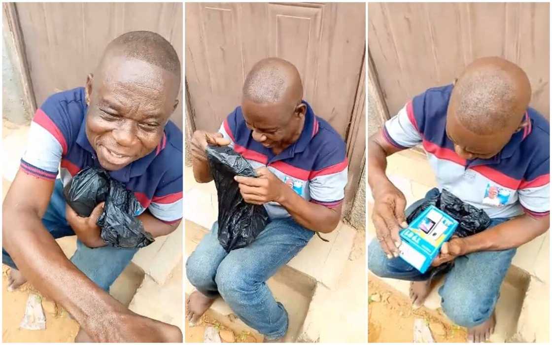 A Nigerian dad rushes to open black waterproof as son gifts him new phone. A Nigerian dad rushes to open black waterproof as son gifts him new phone.