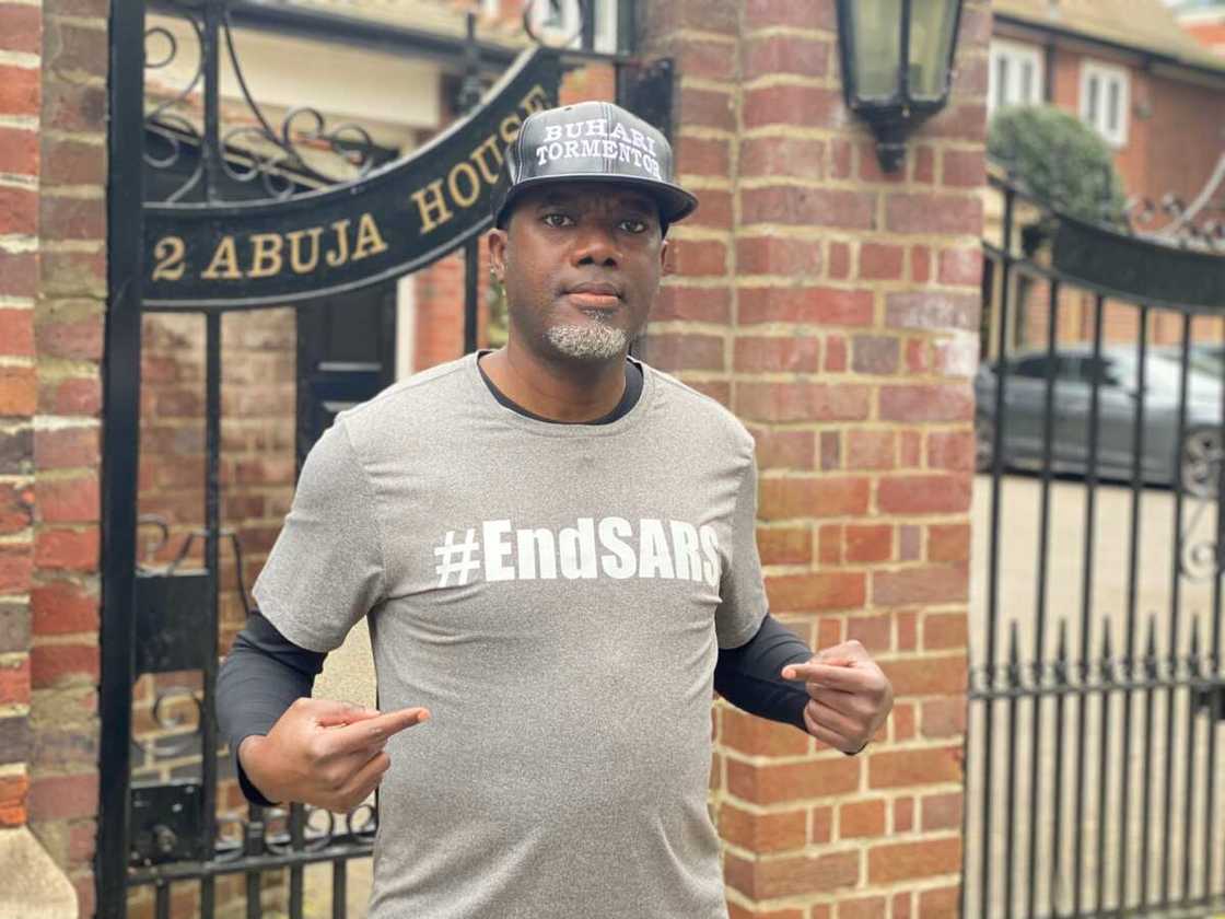 Video Shows Reno Omokri Leading Anti-Buhari Protest in Abuja House, London Video Shows Reno Omokri Leading Anti-Buhari Protest in Abuja House, London