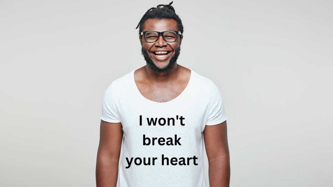 A man laughing while displaying white lie shirt ideas A man laughing while displaying white lie shirt ideas