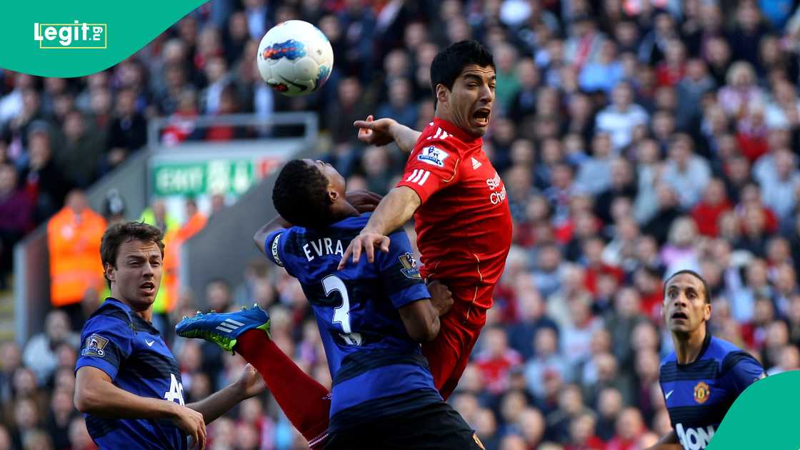 Luis Suarez, Patrice Evra, Manchester United, Liverpool. Luis Suarez, Patrice Evra, Manchester United, Liverpool.