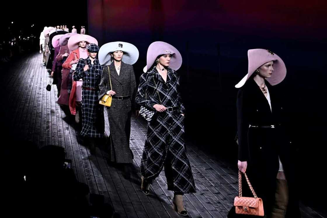 The hats were a nod to Chanel's beginnings on the Deauville seafront The hats were a nod to Chanel's beginnings on the Deauville seafront