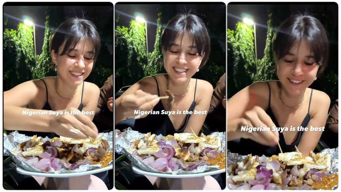 Young oyinbo lady tastes suya. Young oyinbo lady tastes suya.