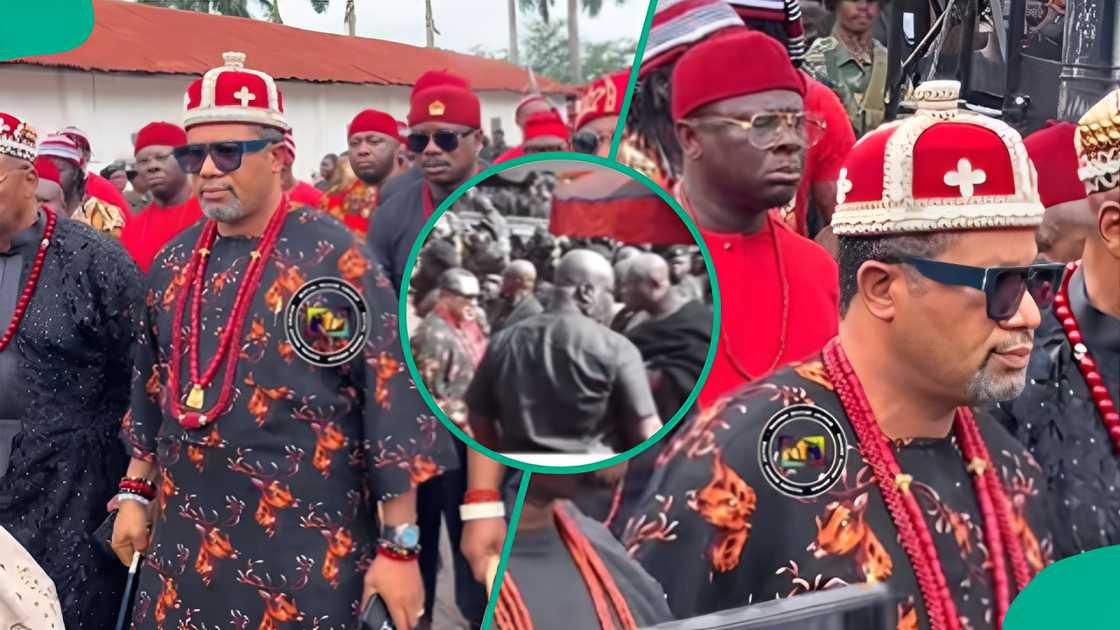 A self-acclaimed Nigerian king in Ghana attempts to shake hands with a Ghanaian king during a royal event.