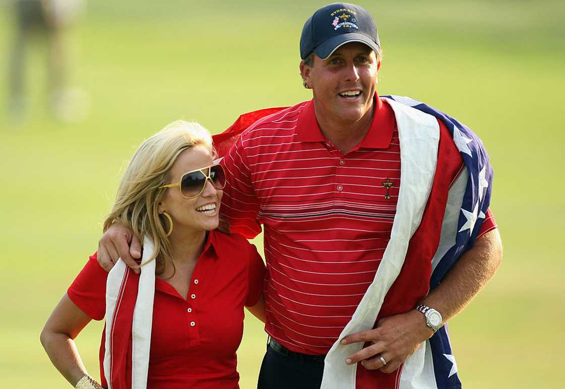 Amy and Phil Mickelson enjoy a moment after a golf tournament victory Amy and Phil Mickelson enjoy a moment after a golf tournament victory