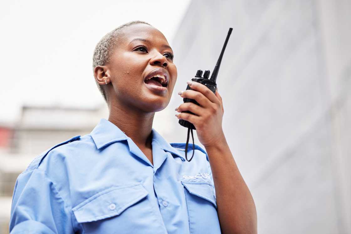 a female traffic officer talking on radio