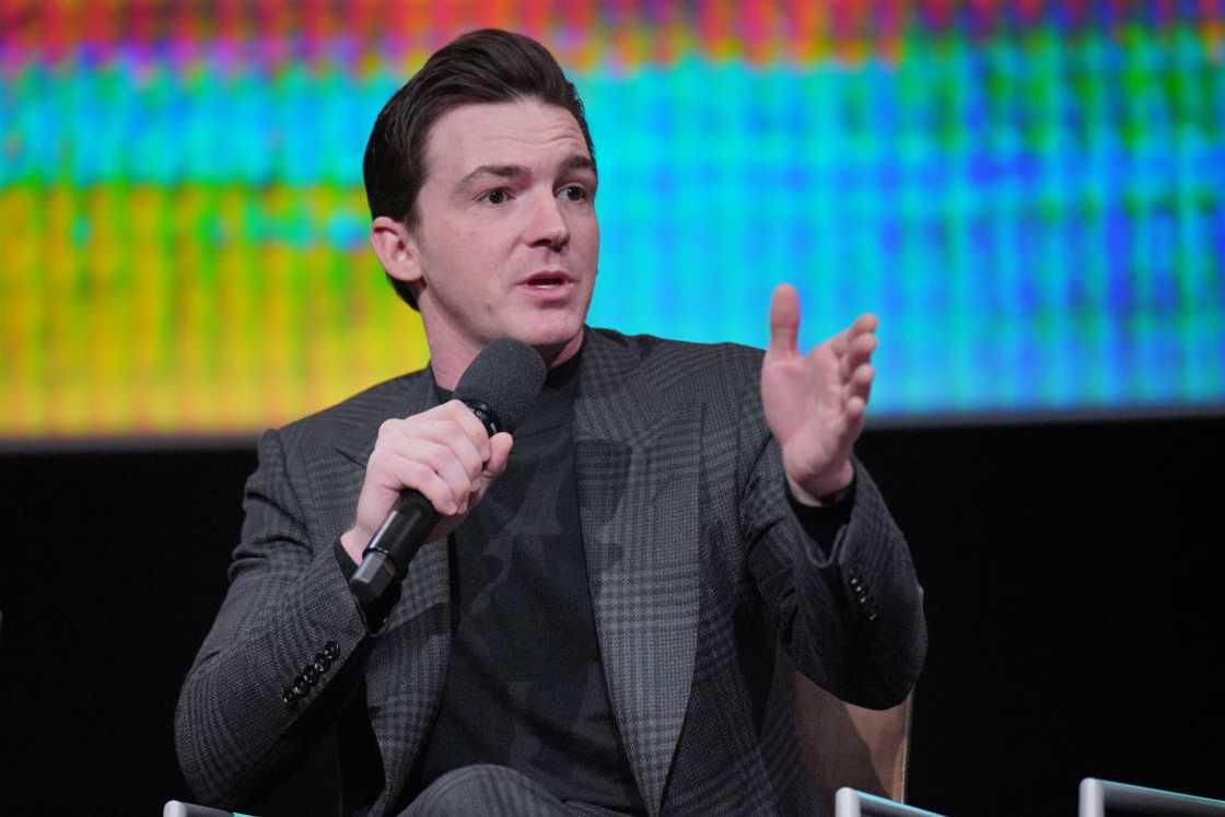 Drake Bell speaks onstage at Saban Media Center in North Hollywood, California Drake Bell speaks onstage at Saban Media Center in North Hollywood, California