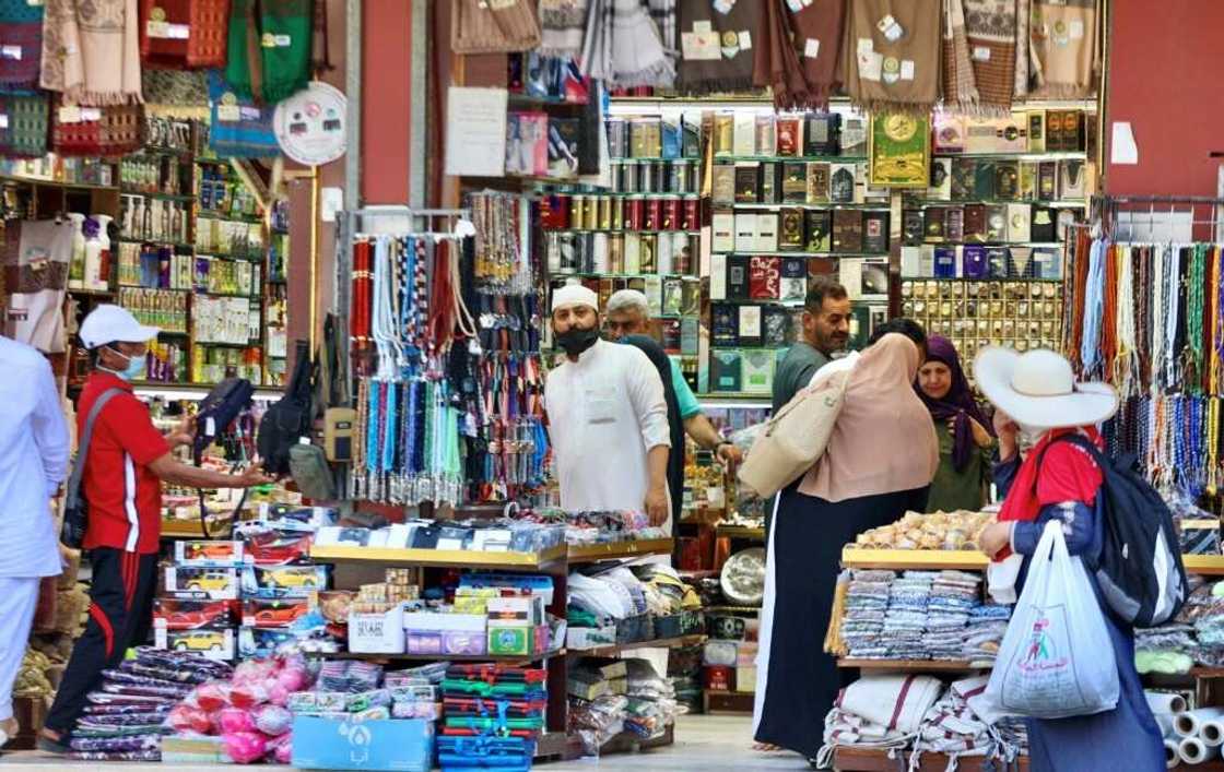 Muslim pilgrims shop in the holy city of Mecca -- part of a resurgence in business that has cheered local merchants