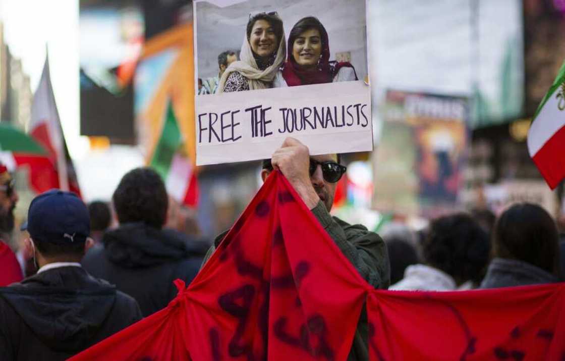 Demonstrators gather at Times Square in New York during a protest in support of women's freedom in Iran