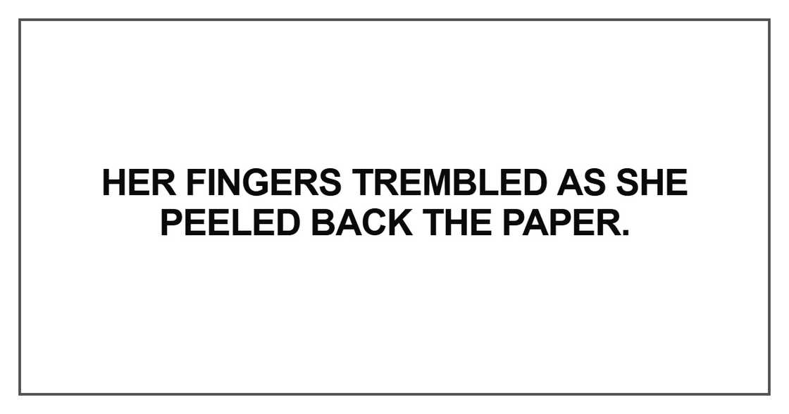 Her fingers trembled as she peeled back the paper Her fingers trembled as she peeled back the paper