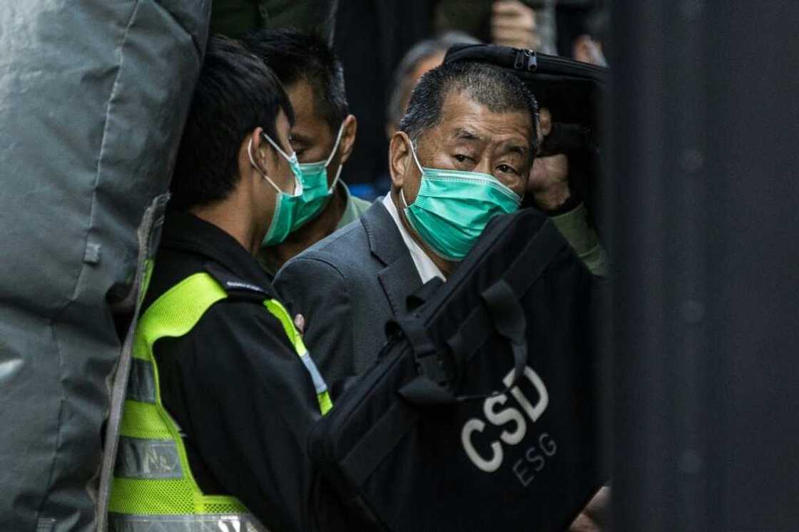 A Hong Kong judge has ruled that phones belonging to media tycoon Jimmy Lai (R) may be searched under the city's Beijing-imposed national security law A Hong Kong judge has ruled that phones belonging to media tycoon Jimmy Lai (R) may be searched under the city's Beijing-imposed national security law