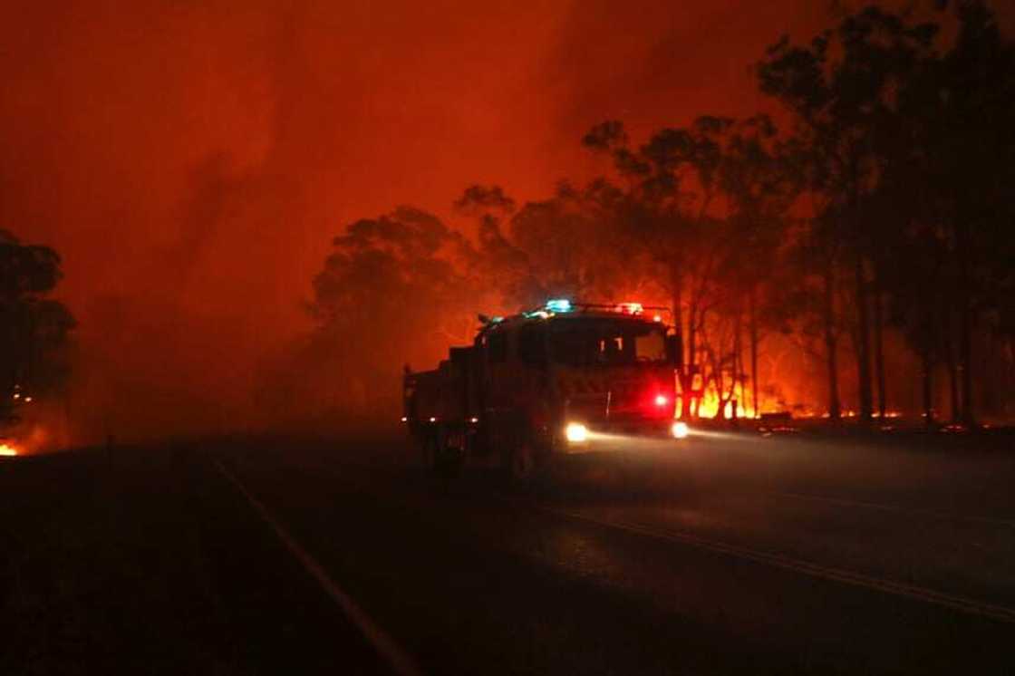 Skies turn blood red in Australia as massive bush fires rage on Skies turn blood red in Australia as massive bush fires rage on