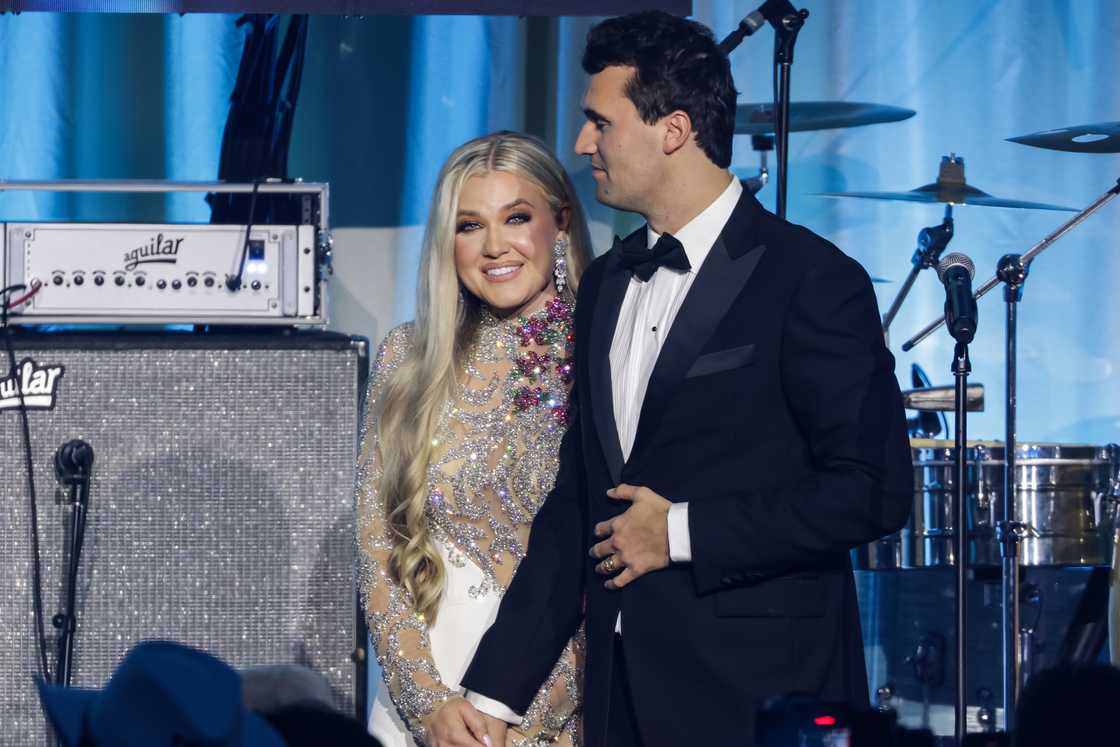 Charlie Kirk and and his wife Erika Lane Frantzve on stage during the Turning Point USA Inaugural-Eve Ball at the Salamander Hotel in Washington