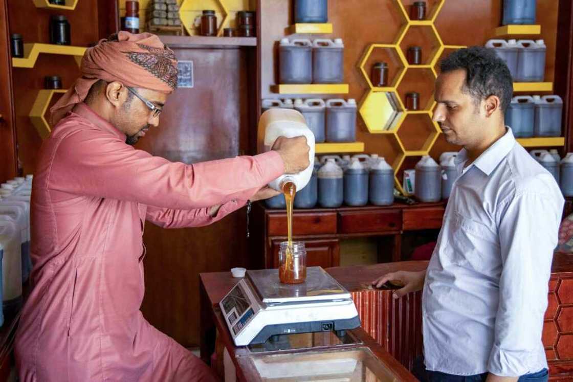 Shopkeepers in Yemen's third city Taez say they made a good living selling honey before the war but now few customers can afford it Shopkeepers in Yemen's third city Taez say they made a good living selling honey before the war but now few customers can afford it