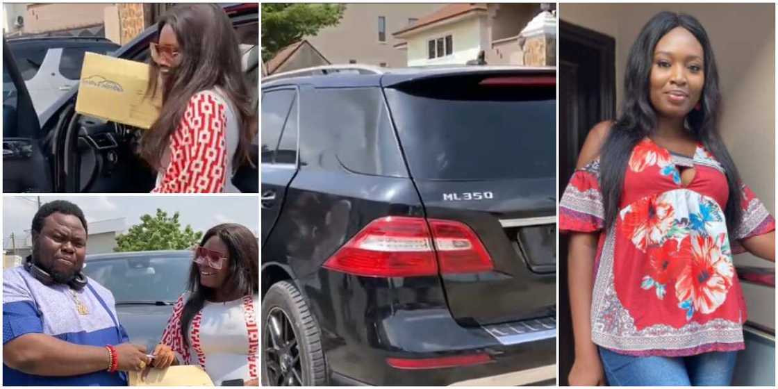 Mo Bimpe collects her car key and papers from dealership Mo Bimpe collects her car key and papers from dealership