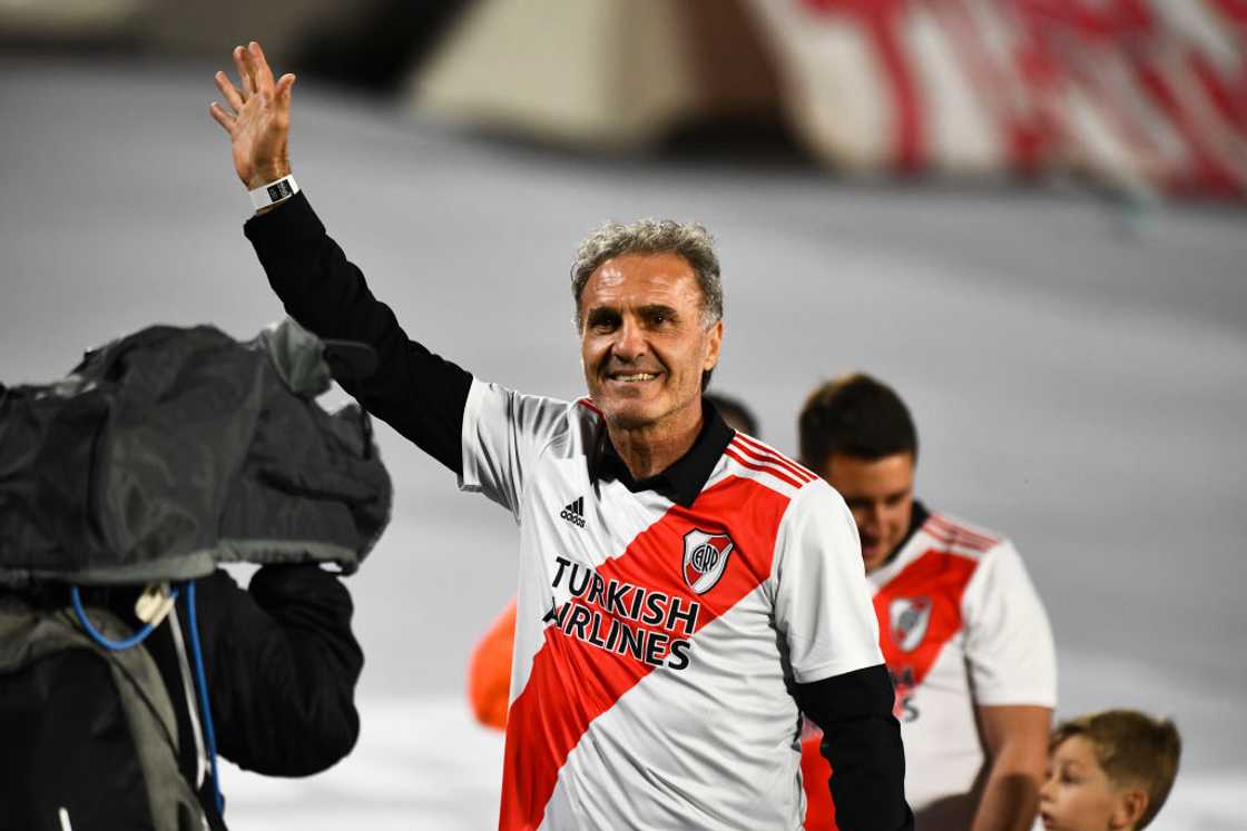 Oscar Ruggeri waves to football fans at Estadio Monumental Antonio Vespucio Liberti before a match Oscar Ruggeri waves to football fans at Estadio Monumental Antonio Vespucio Liberti before a match