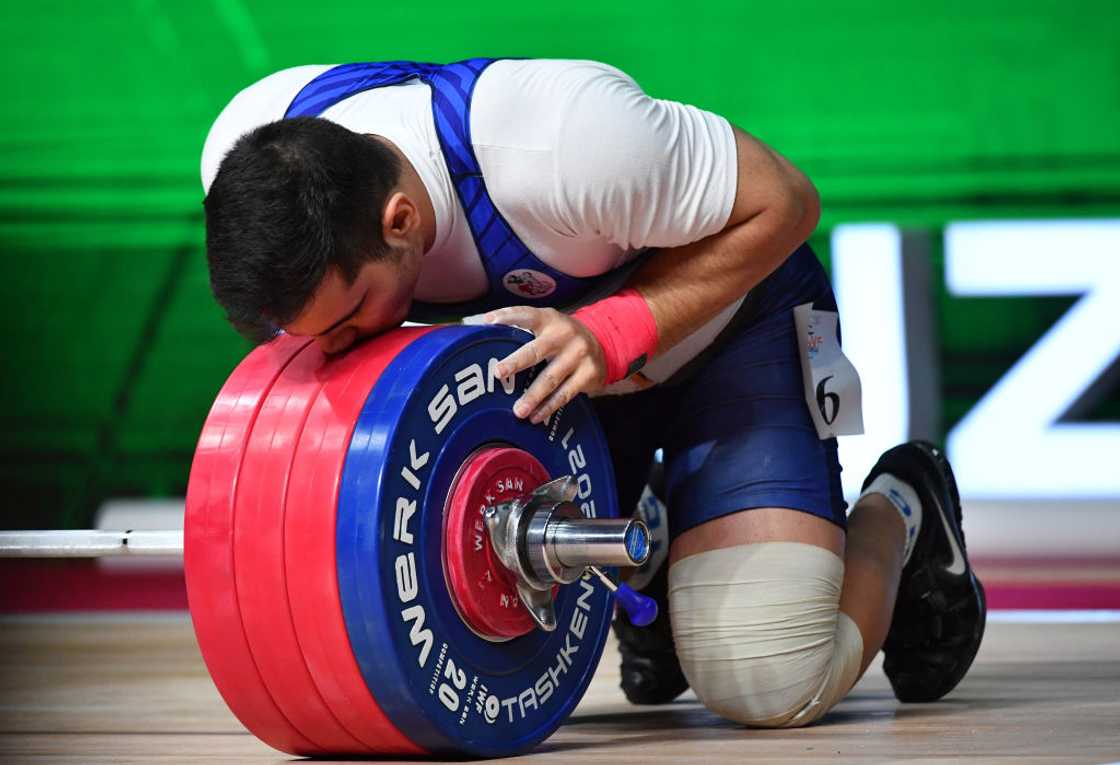 Iranian weightlifter Sedeh Rasoul Motamedi competes at men's 102 kg category