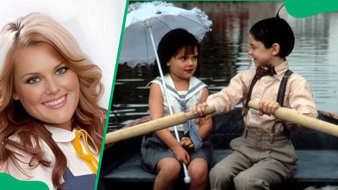 Brittany Ashton Holmes smiling, and her with Bug Hall rowing a boat in a scene from the film 'The Little Rascals' Brittany Ashton Holmes smiling, and her with Bug Hall rowing a boat in a scene from the film 'The Little Rascals'
