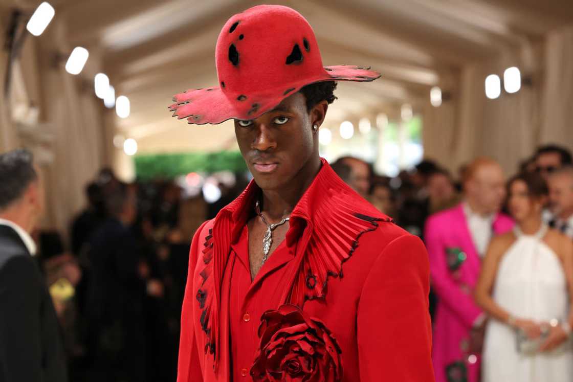 Wisdom Kaye in a red ensemble at The 2024 Met Gala