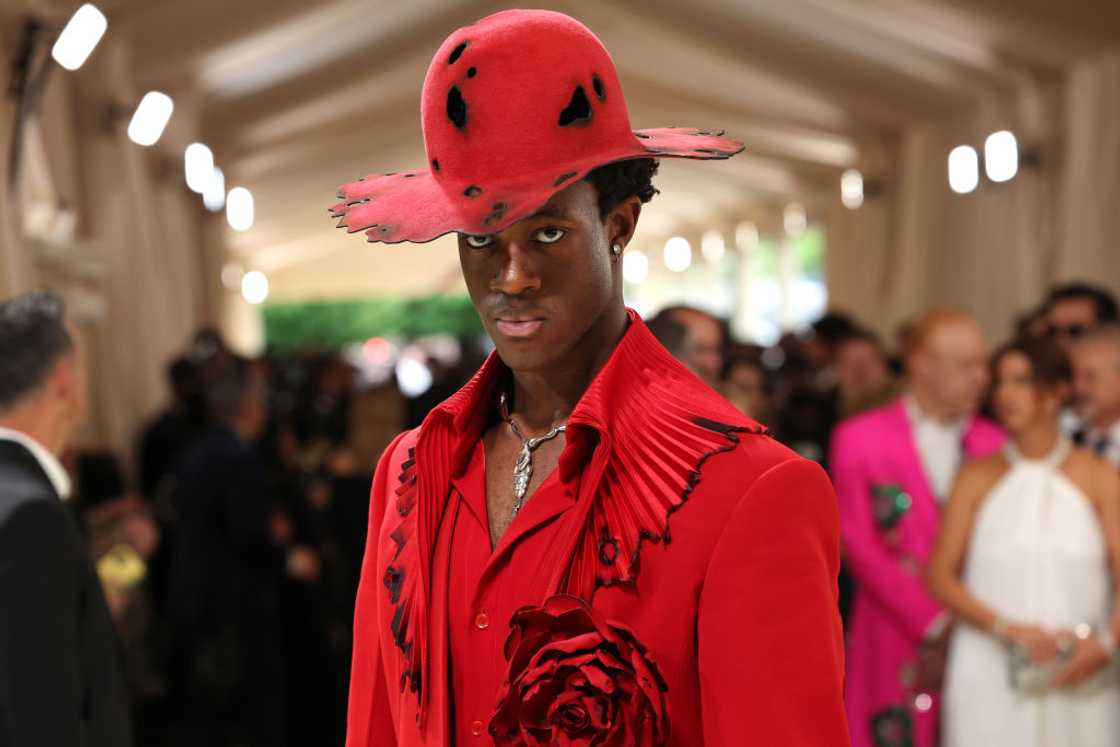 Wisdom Kaye in a red ensemble at The 2024 Met Gala Wisdom Kaye in a red ensemble at The 2024 Met Gala