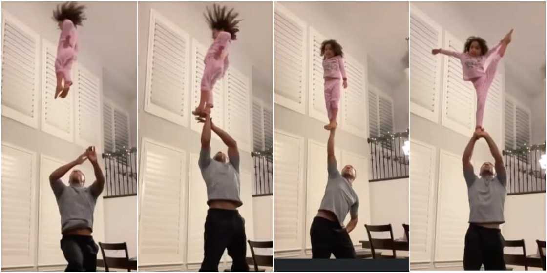 Little girl displays amazing skills as dad throws her in the air Little girl displays amazing skills as dad throws her in the air