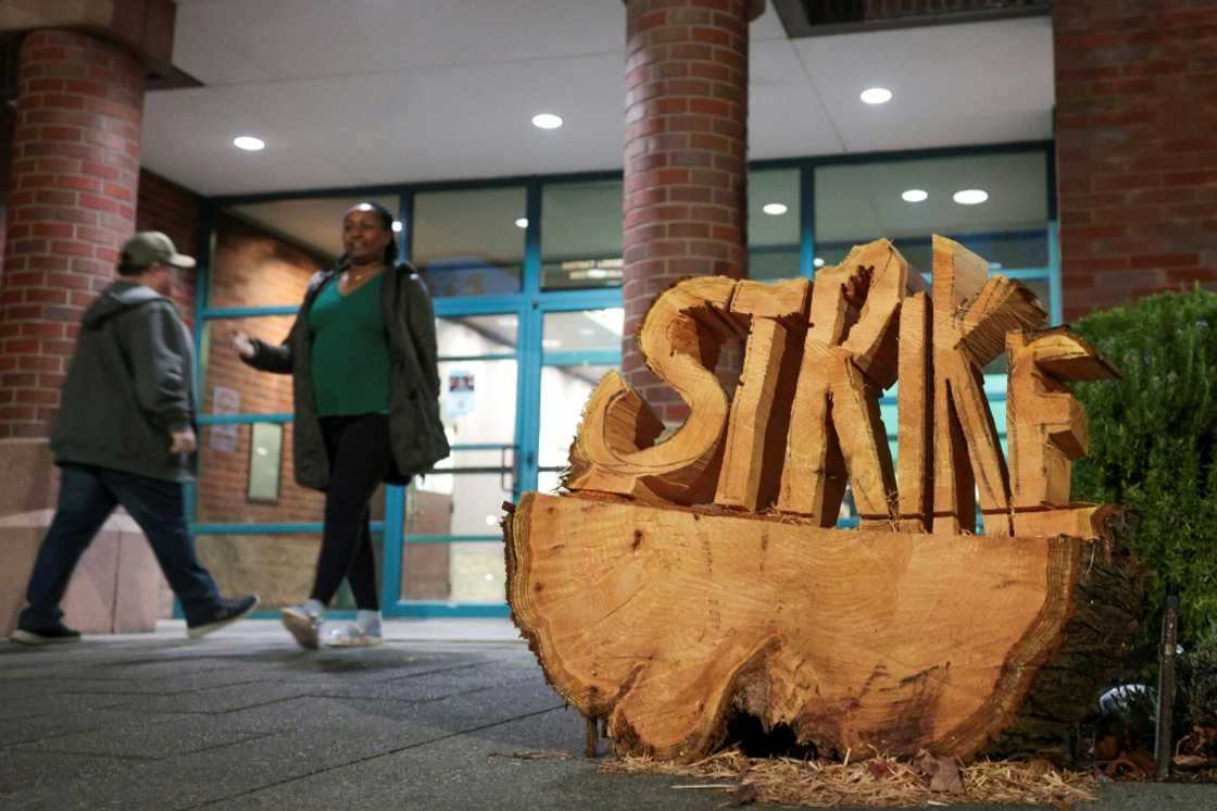 A wood sculpture with the word "strike" is pictured outside as striking Boeing Machinist union members vote on the latest contract offer from the company at the District Lodge 751 in Seattle, Washington, on November 4, 2024