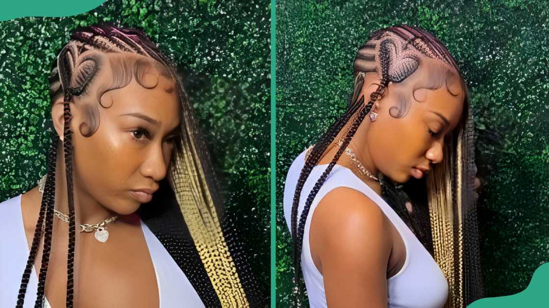 A lady poses with black and blonde coloured lemonade braids with a heart