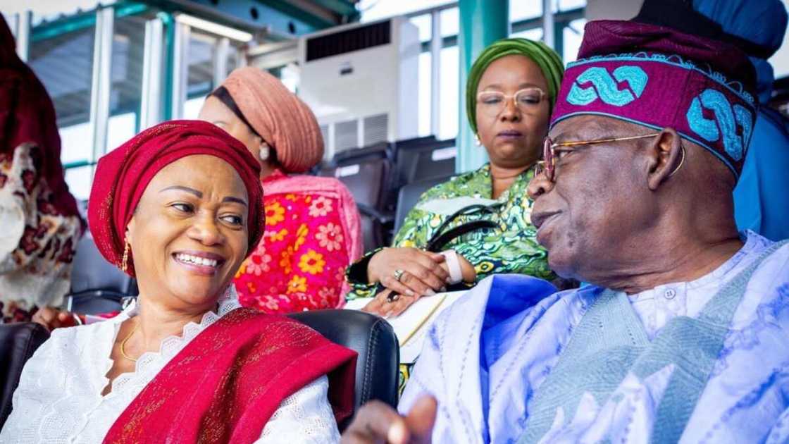 Picture of President Tinubu and the First Lady smiling to each other