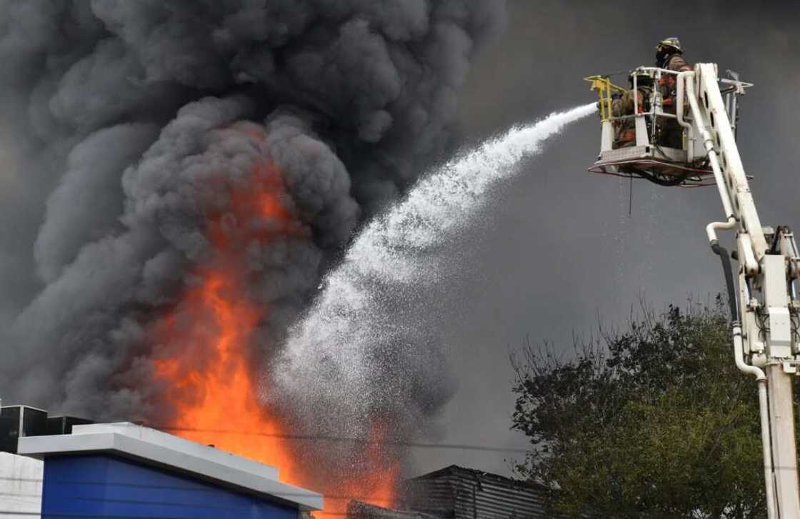 More than 300 personnel were deployed to Paraguay's Superior Court of Elections to fight the flames, which were brought under control after six hours More than 300 personnel were deployed to Paraguay's Superior Court of Elections to fight the flames, which were brought under control after six hours